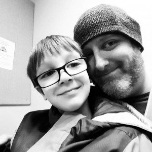 Read more about the article Emmett posing for a cute picture with his old man