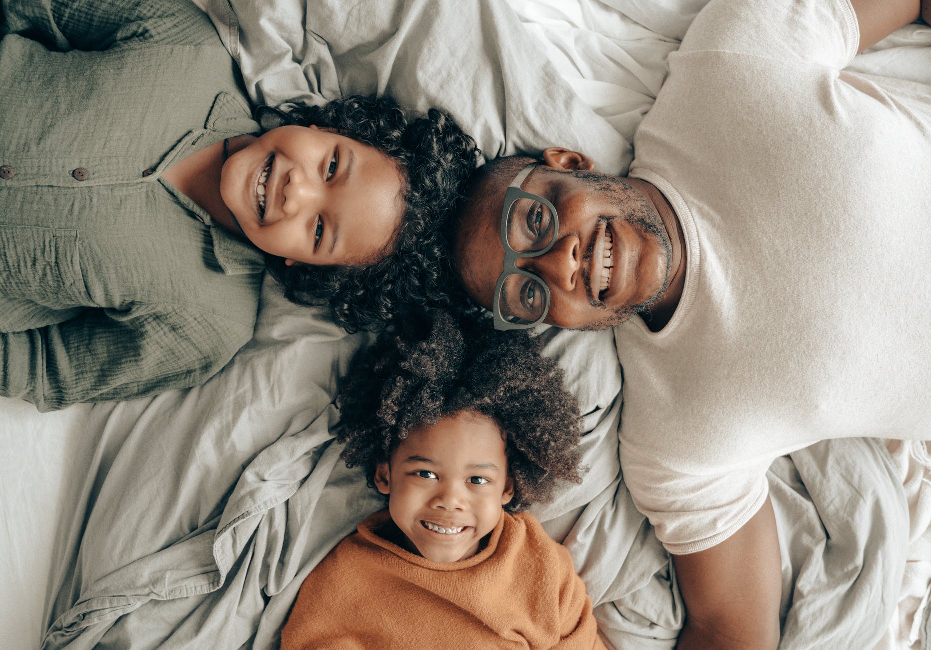 happy family looking at the camera